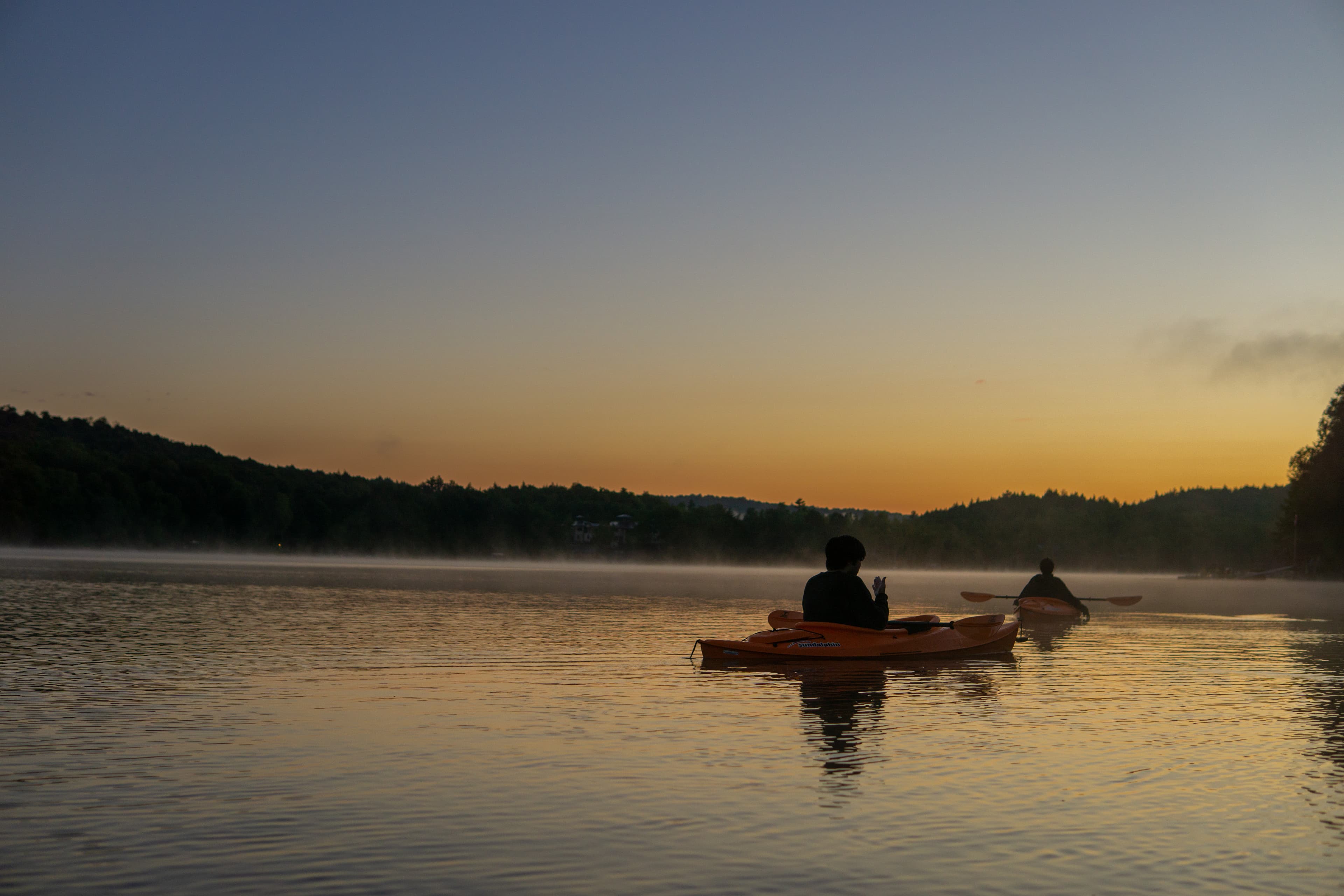 Kayaks on a lake